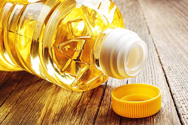 Cooking oil bottle on a wooden table